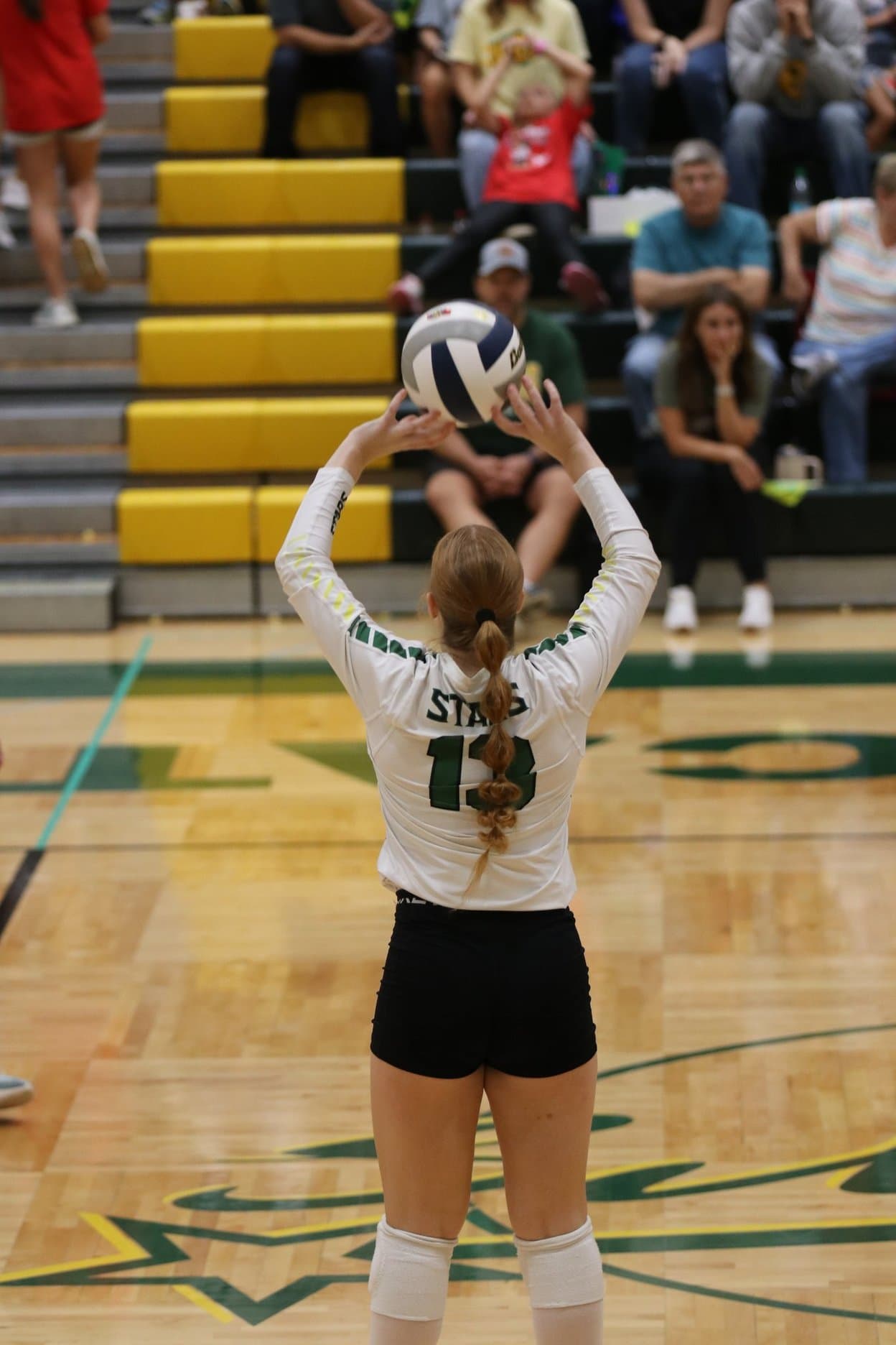 A Stars setter delivers a set on the home court